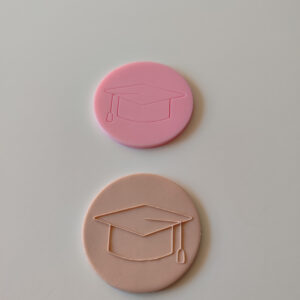 Graduation hat debosser